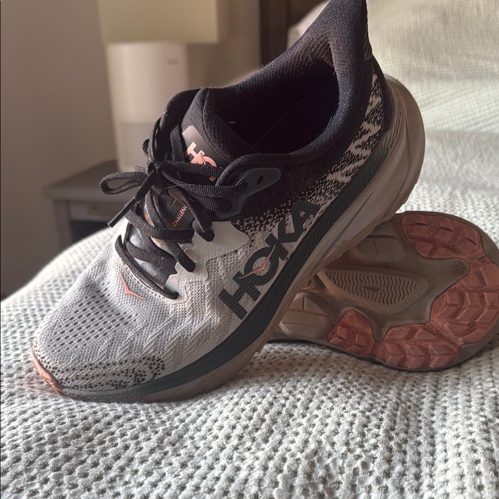Green, grey, salmon color Hoka Challenger ATR trail shoes.